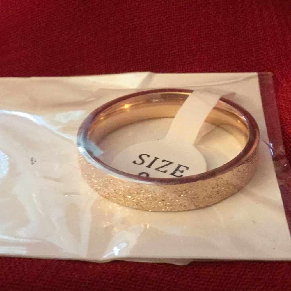 Rose colored ring.